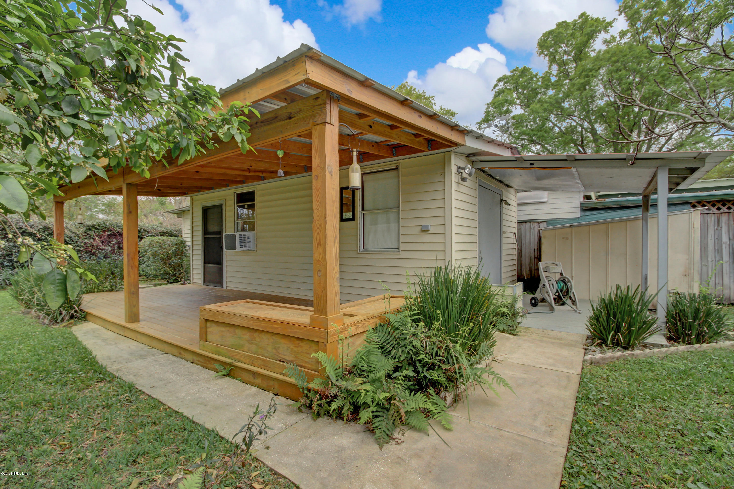 5338 Woodcrest Road Jacksonville, FL 32205 - Photo 19 of 23 Covered Deck