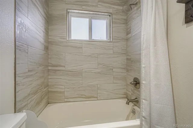a bathroom with a bathtub