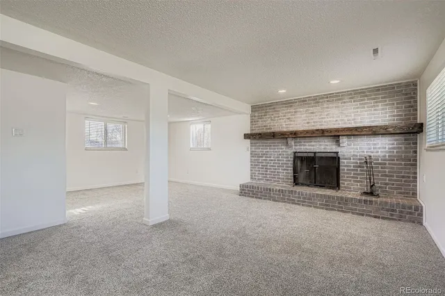 a view of a house with a backyard and porch