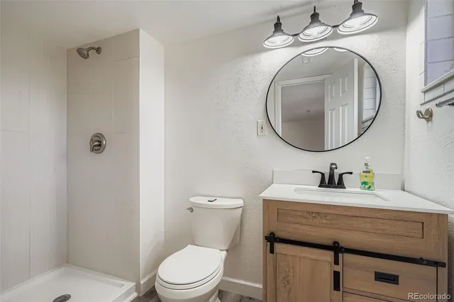 a view of a yard with a house in the background