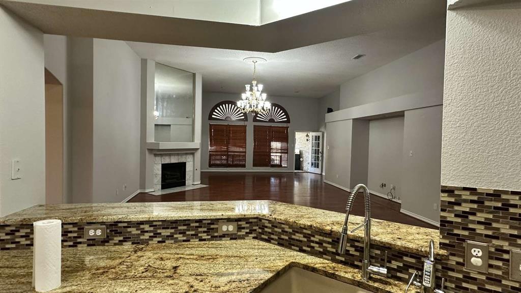 5713 Allen Lane Rowlett, TX 75088 - Photo 11 of 20 a bathroom with a tub and a sink