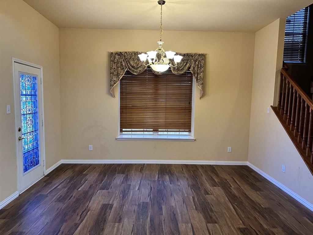 5713 Allen Lane Rowlett, TX 75088 - Photo 12 of 20 a view of dining room with wooden floor