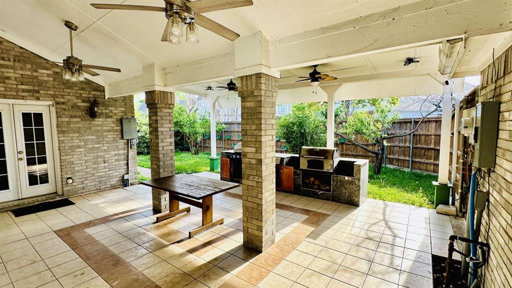 5713 Allen Lane Rowlett, TX 75088 - Photo 7 of 20 a view of a porch with furniture and a yard