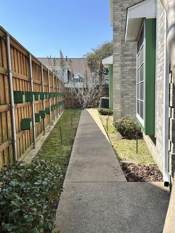 5713 Allen Lane Rowlett, TX 75088 - Photo 8 of 20 a view of a pathway with a pathway