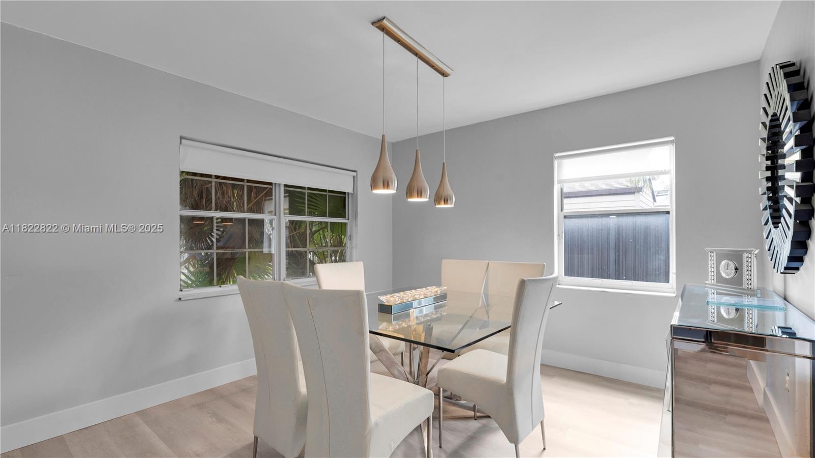 8356 Southwest 158th Avenue Miami, FL 33193 - Photo 11 of 48 a view of a dining room with furniture and window