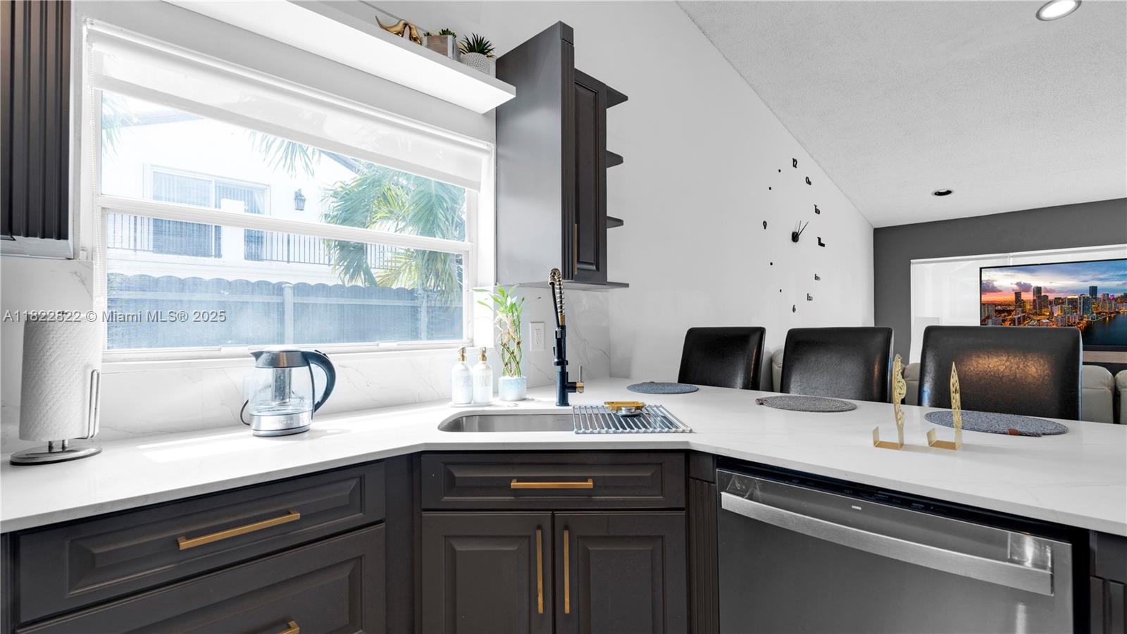 8356 Southwest 158th Avenue Miami, FL 33193 - Photo 16 of 48 a kitchen with a sink and a window