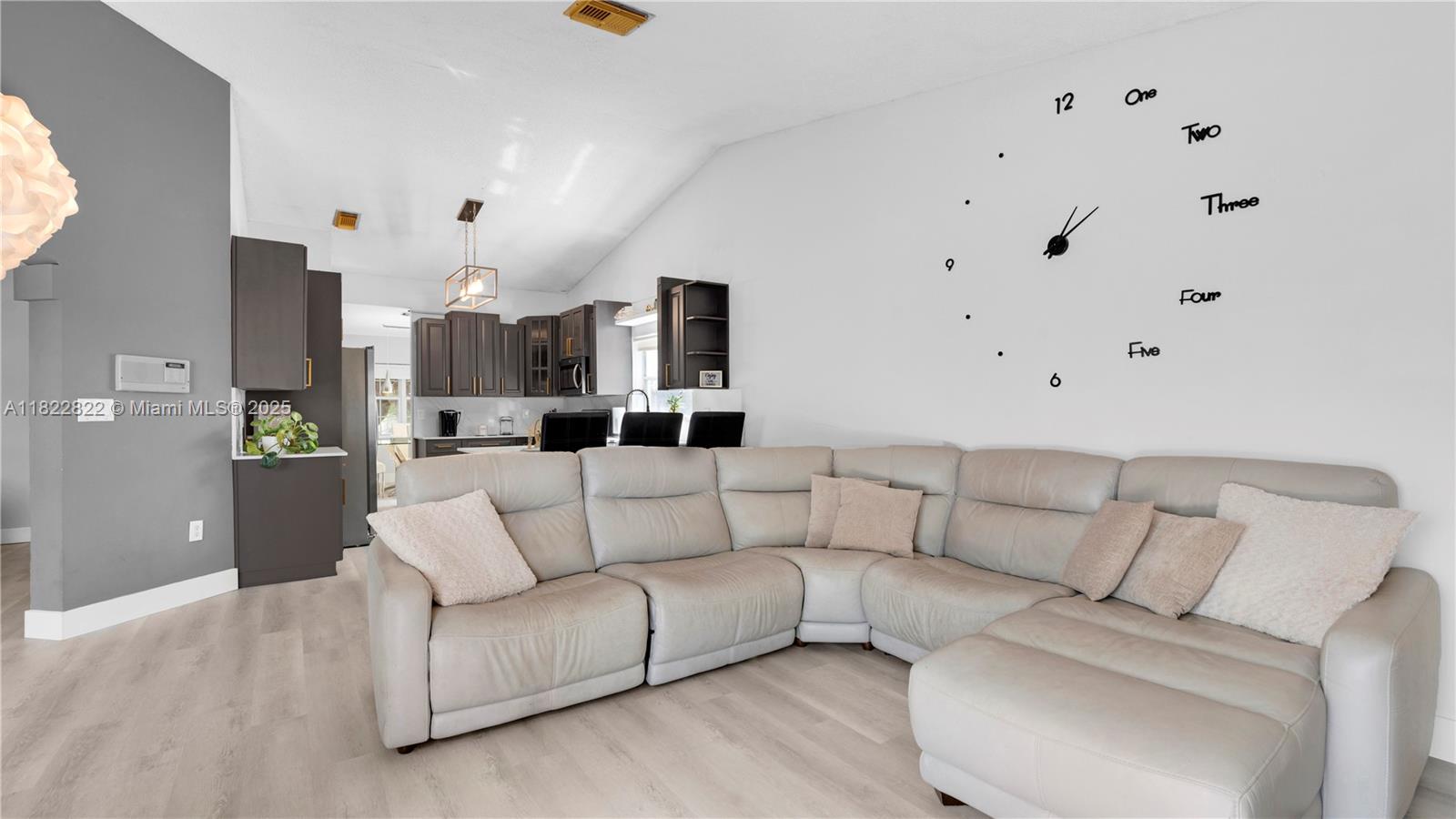 8356 Southwest 158th Avenue Miami, FL 33193 - Photo 18 of 48 a living room with furniture and a couch