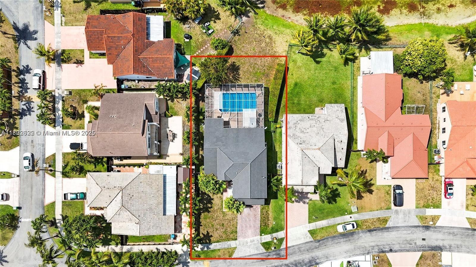 8356 Southwest 158th Avenue Miami, FL 33193 - Photo 3 of 48 an aerial view of multiple houses with outdoor space