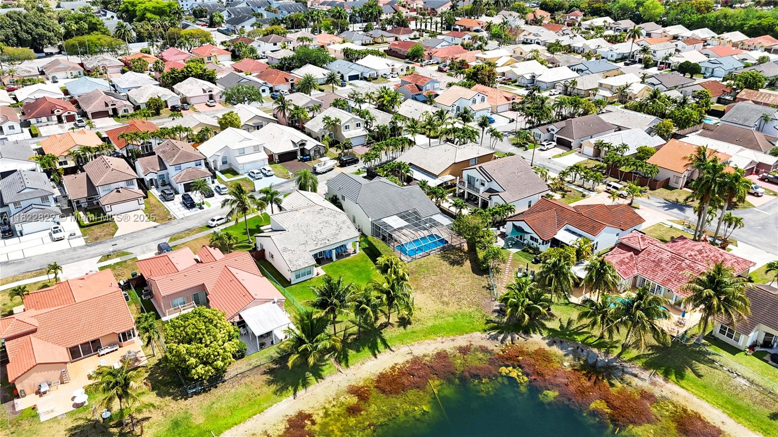 8356 Southwest 158th Avenue Miami, FL 33193 - Photo 5 of 48 an aerial view of residential houses with outdoor space and trees all around