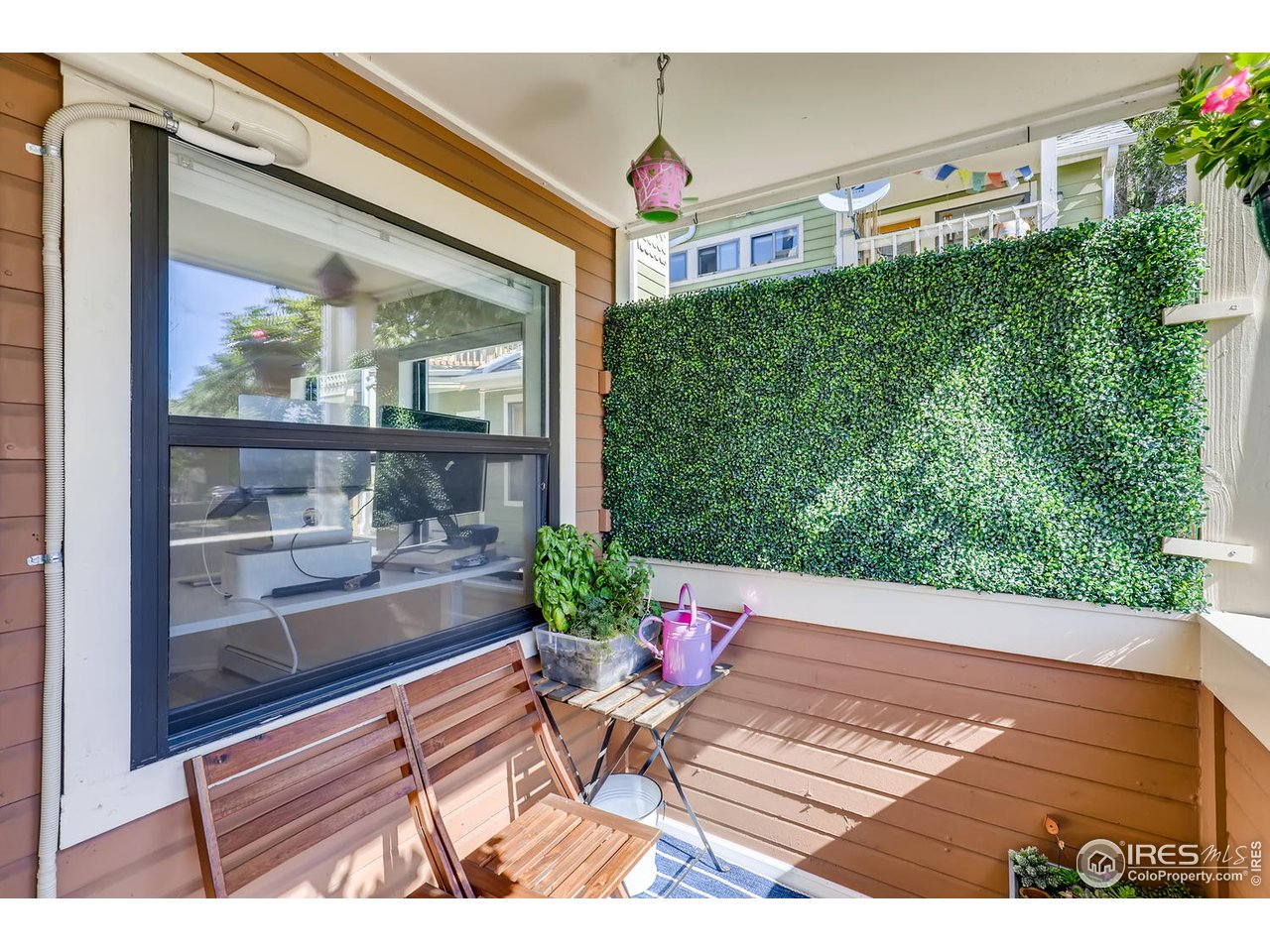 3025 Broadway, Unit 5 Boulder, CO 80304 - Photo 23 of 30 Balcony with privacy hedge