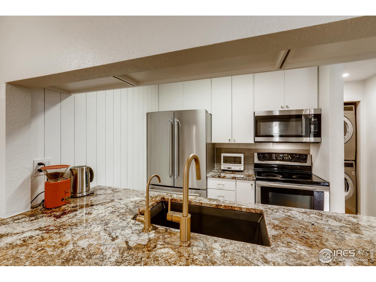 3025 Broadway, Unit 5 Boulder, CO 80304 - Photo 10 of 30 Brushed brass spray faucet + water filter