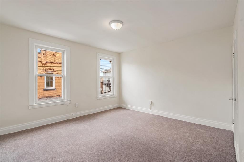23 Edith Place Pittsburgh, PA 15213 - Photo 12 of 23 an empty room with windows