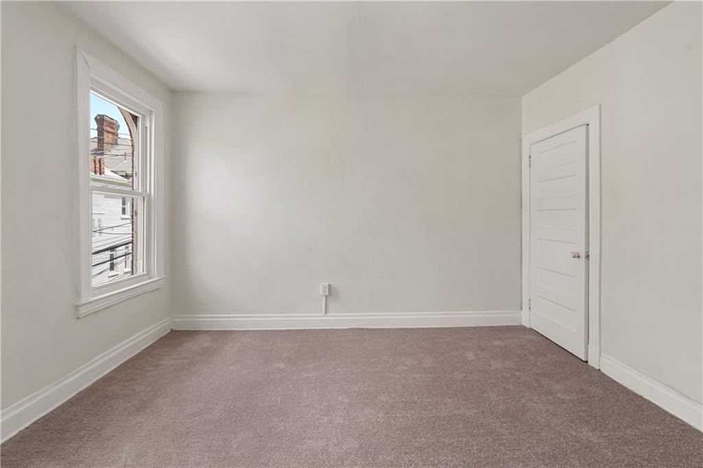 23 Edith Place Pittsburgh, PA 15213 - Photo 13 of 23 an empty room with windows