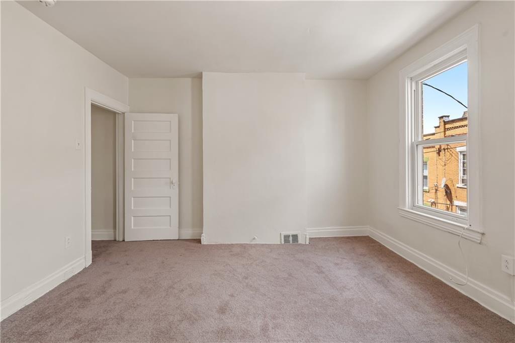 23 Edith Place Pittsburgh, PA 15213 - Photo 14 of 23 an empty room with windows