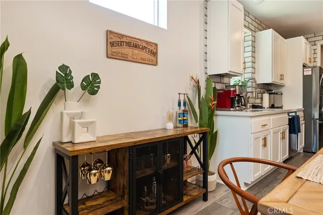 a living room with fireplace furniture and a flat screen tv