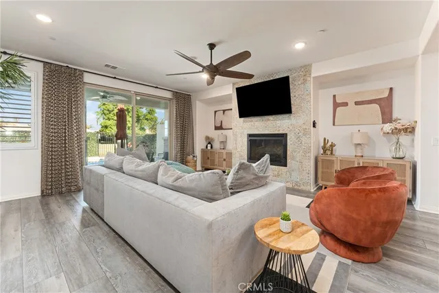 a view of kitchen with furniture and wooden floor