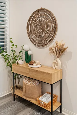 a view of a room with chair and wooden floor
