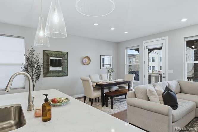 1925 Canyonpoint Place Castle Pines, CO 80108 - Photo 14 of 50 a living room with furniture