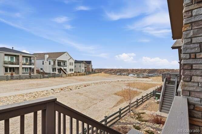 1925 Canyonpoint Place Castle Pines, CO 80108 - Photo 38 of 50 a view of an ocean with city
