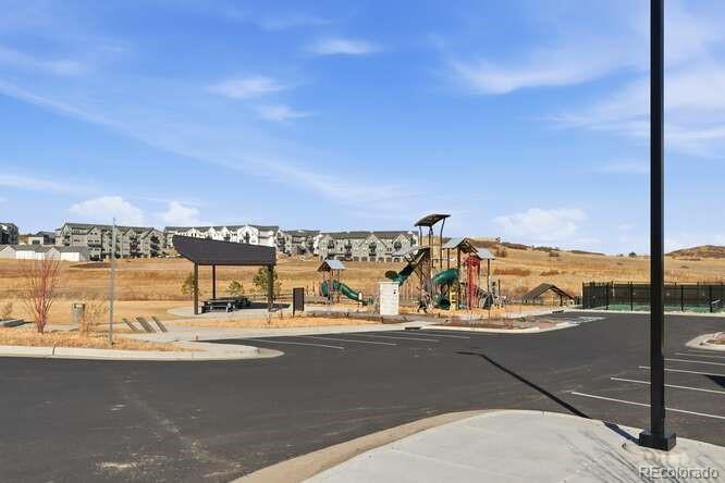 1925 Canyonpoint Place Castle Pines, CO 80108 - Photo 47 of 50 a view of a city