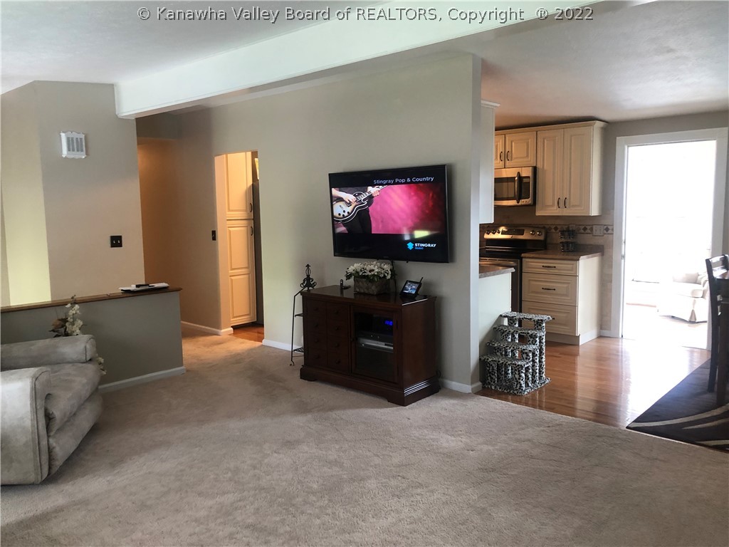 LIVING ROOM INTO KITCHEN/DINING AND SUNROOM