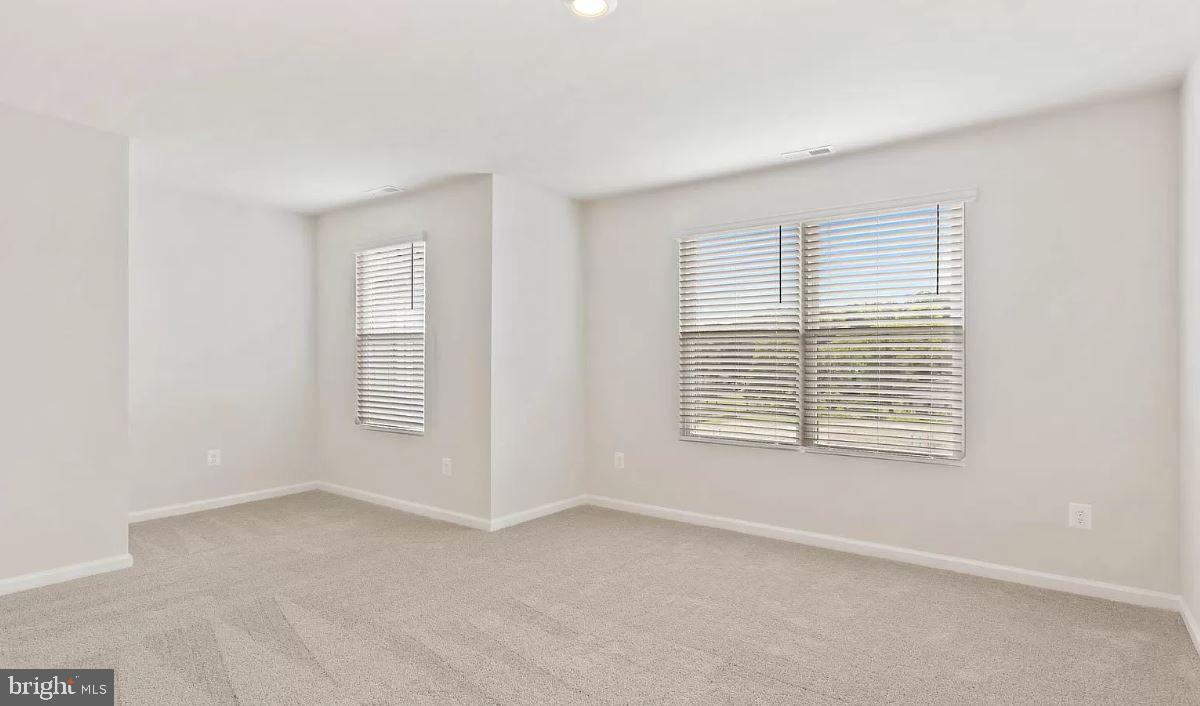 58 Cramsford Street Falling Waters, WV 25419 - Photo 6 of 9 a view of an empty room with a window