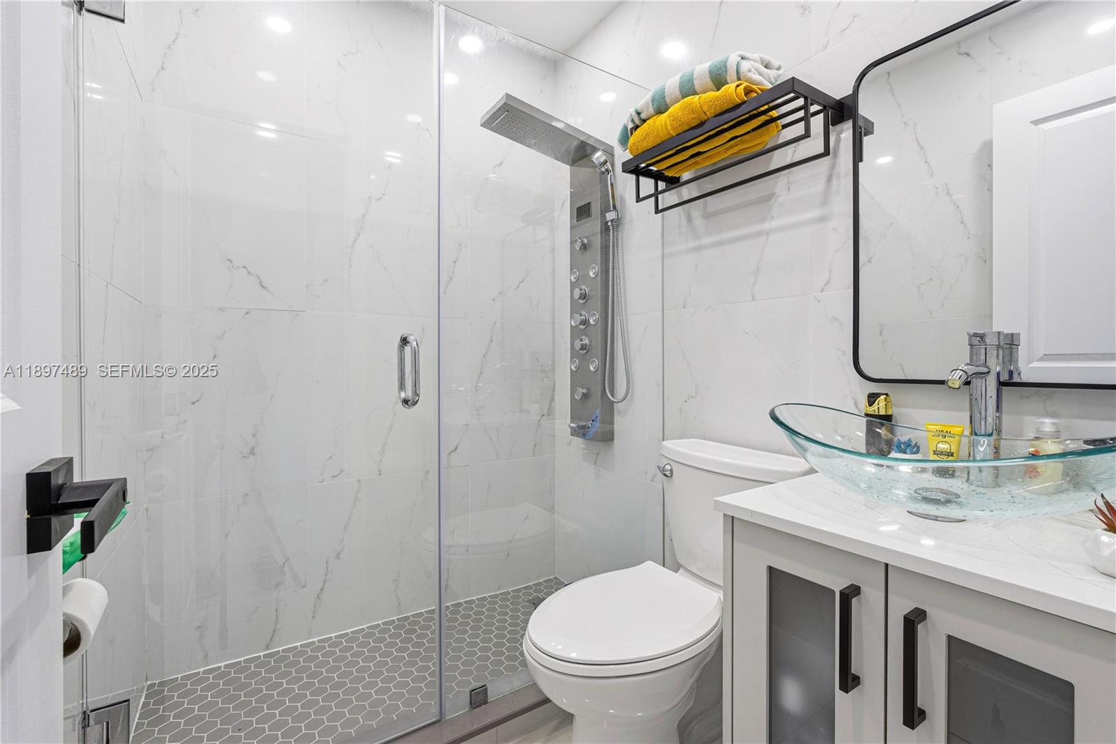 13765 Southwest 54th Lane Miami, FL 33175 - Photo 12 of 30 a bathroom with a granite countertop sink toilet and shower