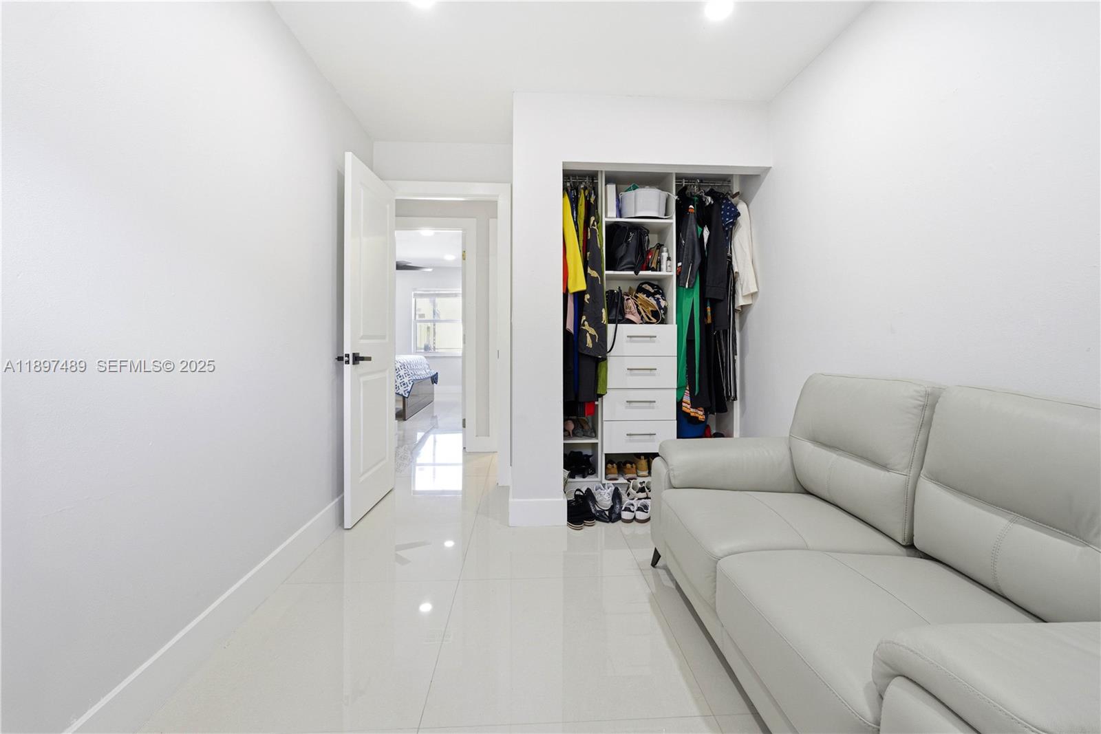 13765 Southwest 54th Lane Miami, FL 33175 - Photo 15 of 30 a living room with furniture and a couch