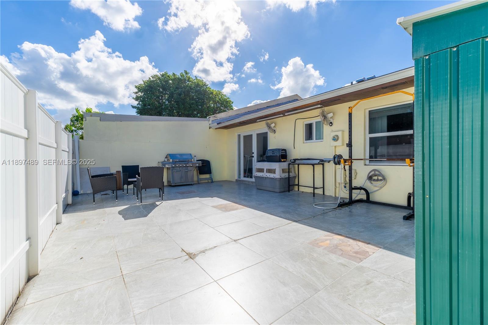 13765 Southwest 54th Lane Miami, FL 33175 - Photo 20 of 30 a view of a patio with furniture