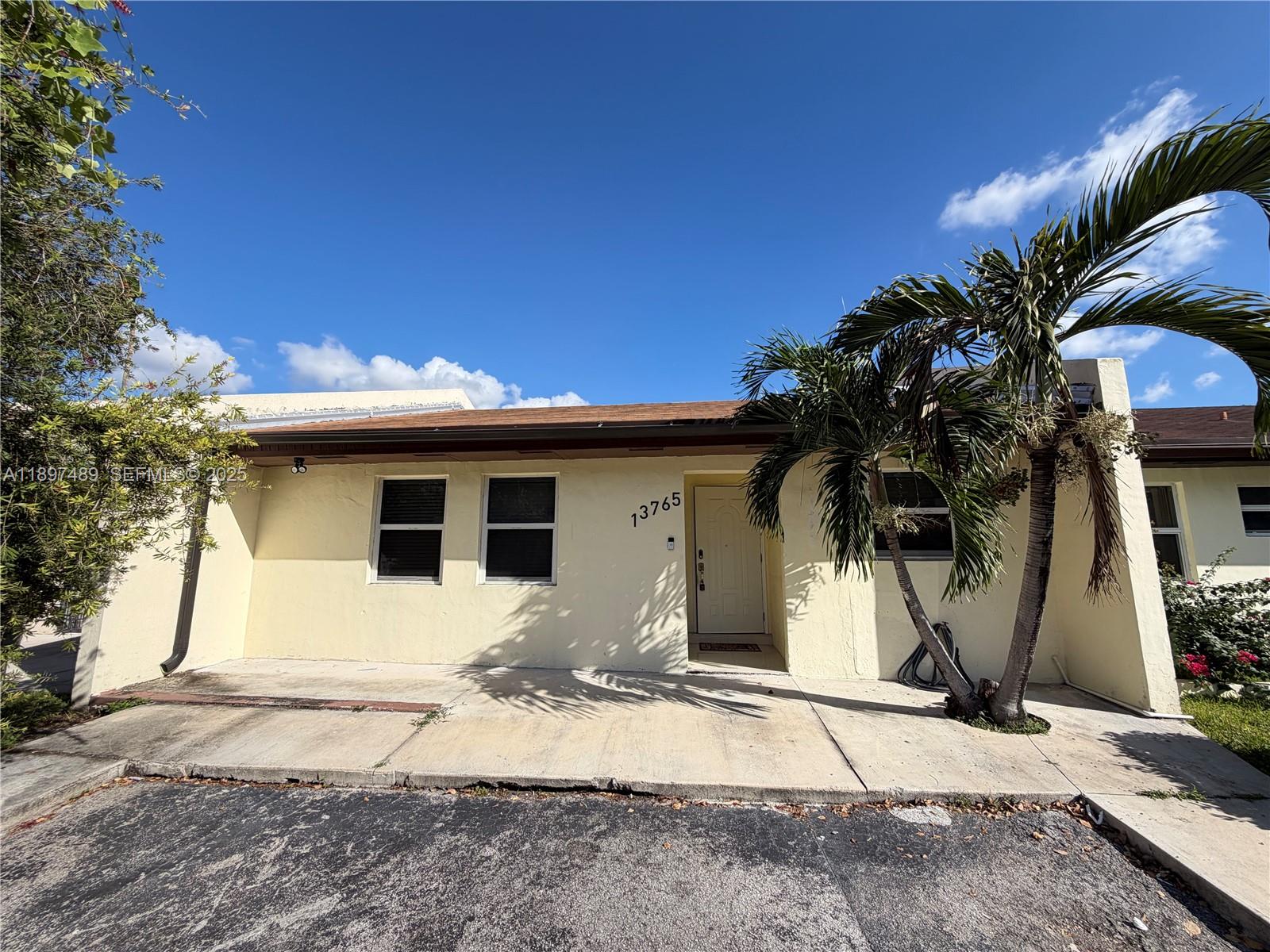 13765 Southwest 54th Lane Miami, FL 33175 - Photo 23 of 30 a view of a house with a patio