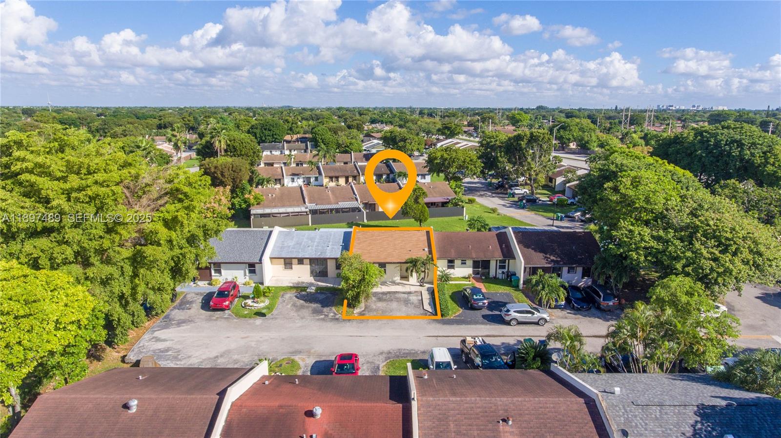 13765 Southwest 54th Lane Miami, FL 33175 - Photo 27 of 30 a view of multiple houses with a yard