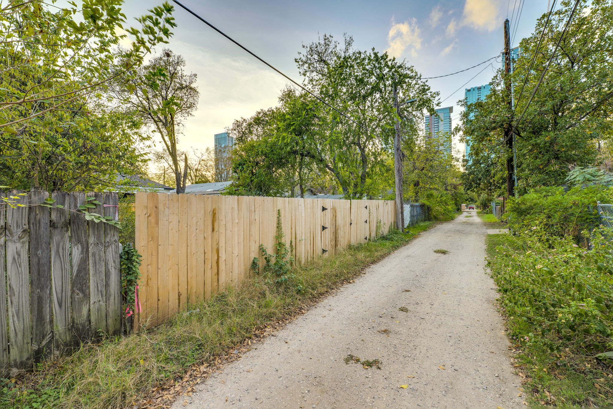 1020 Spence Street, Unit B Austin, TX 78702 - Photo 5 of 9 a view of a wooden fence