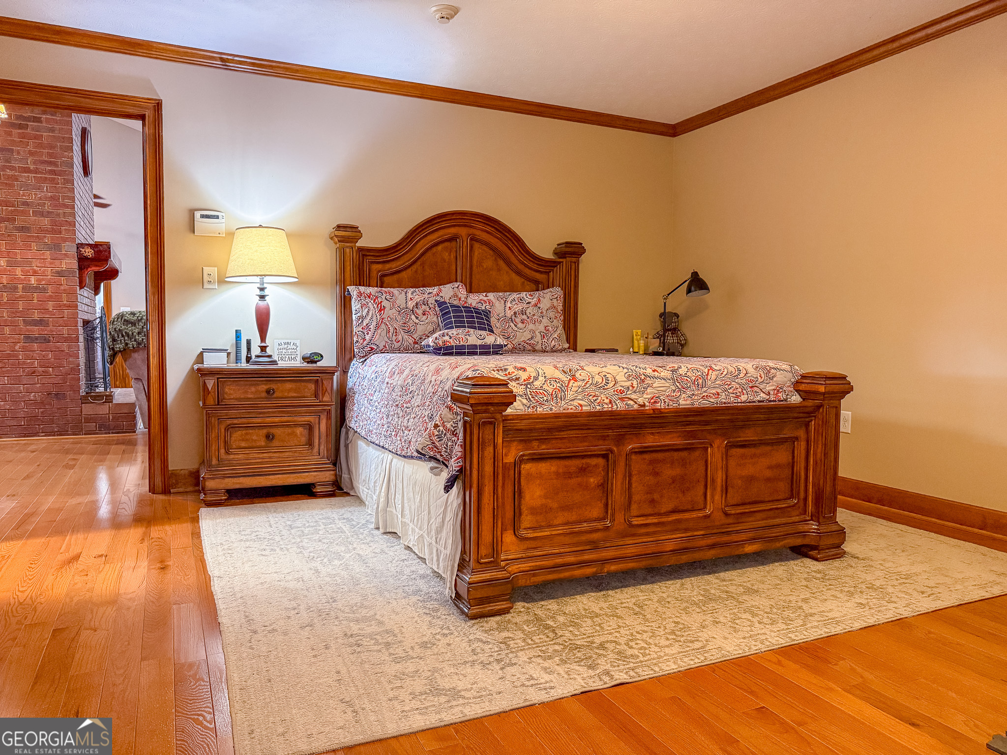 721 Thrasher Road Plains, GA 31780 - Photo 11 of 27 a bedroom with a bed and a dresser