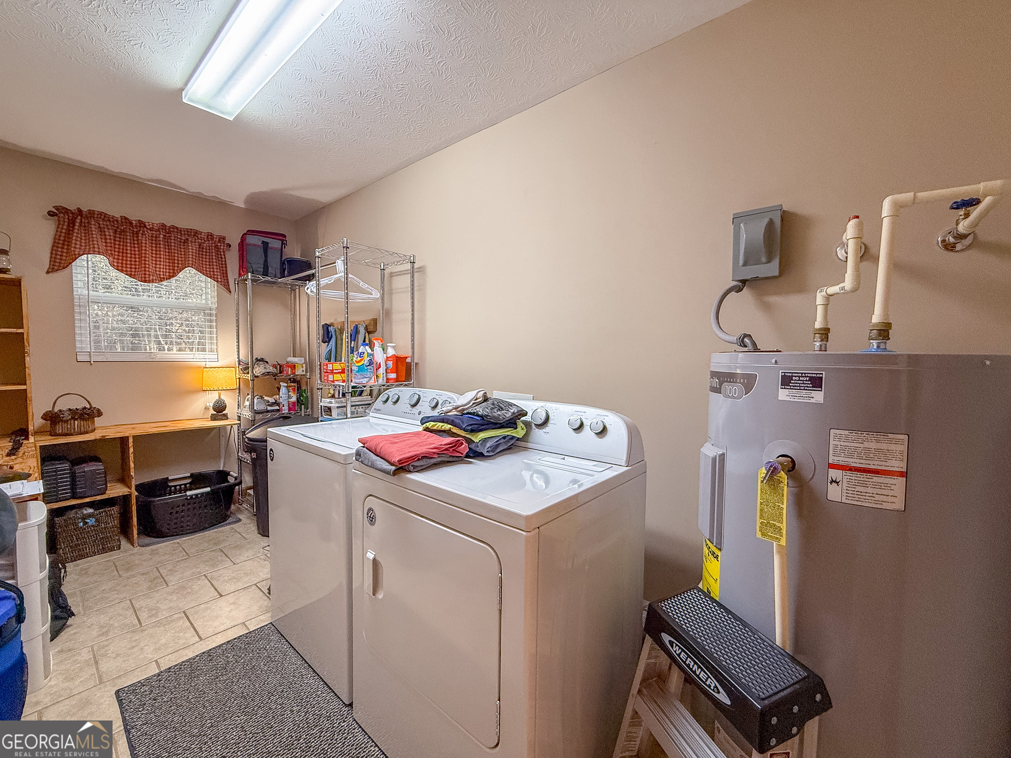 721 Thrasher Road Plains, GA 31780 - Photo 17 of 27 a room with storage and utility