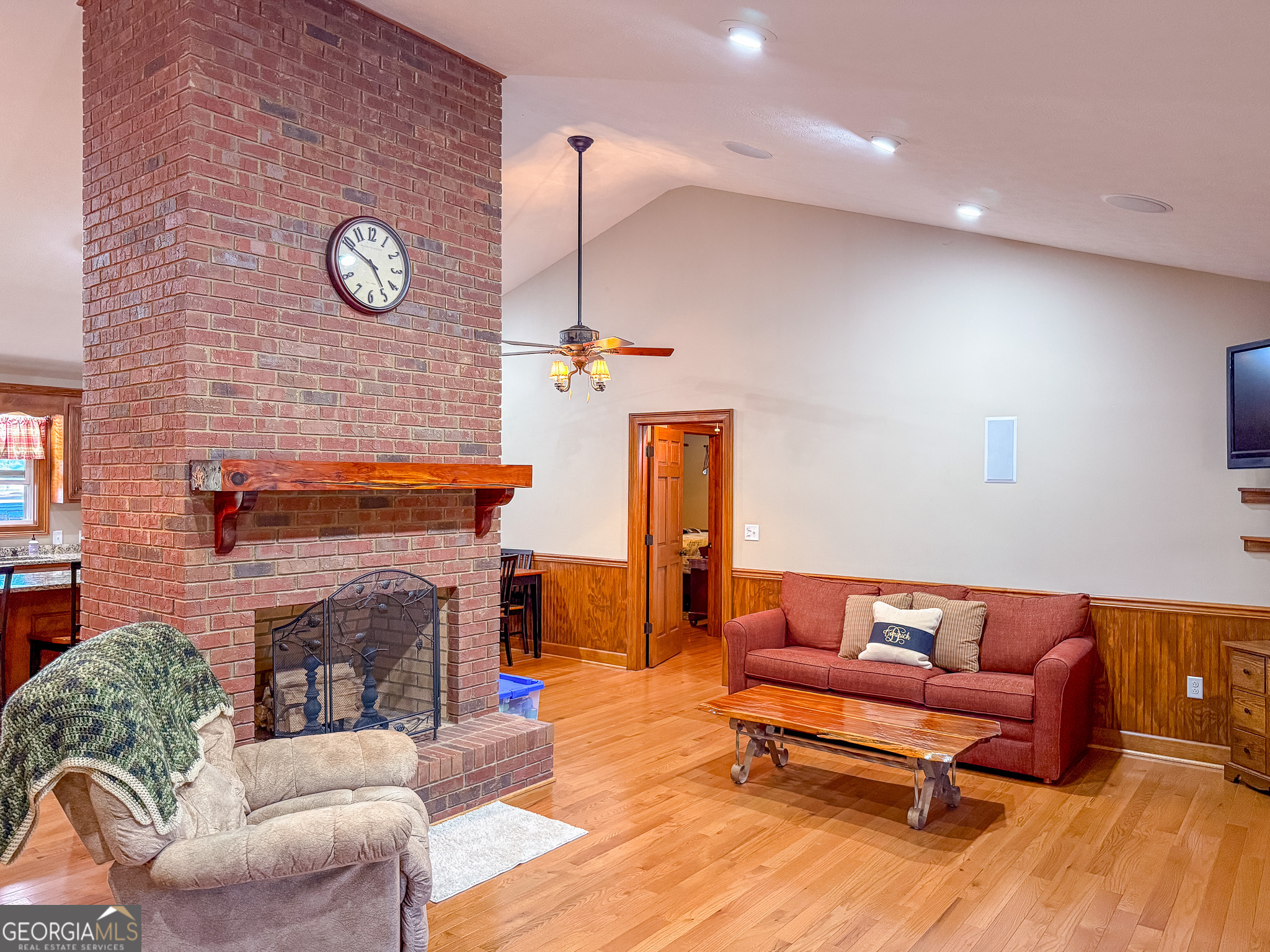 721 Thrasher Road Plains, GA 31780 - Photo 6 of 27 a living room with furniture and a fireplace
