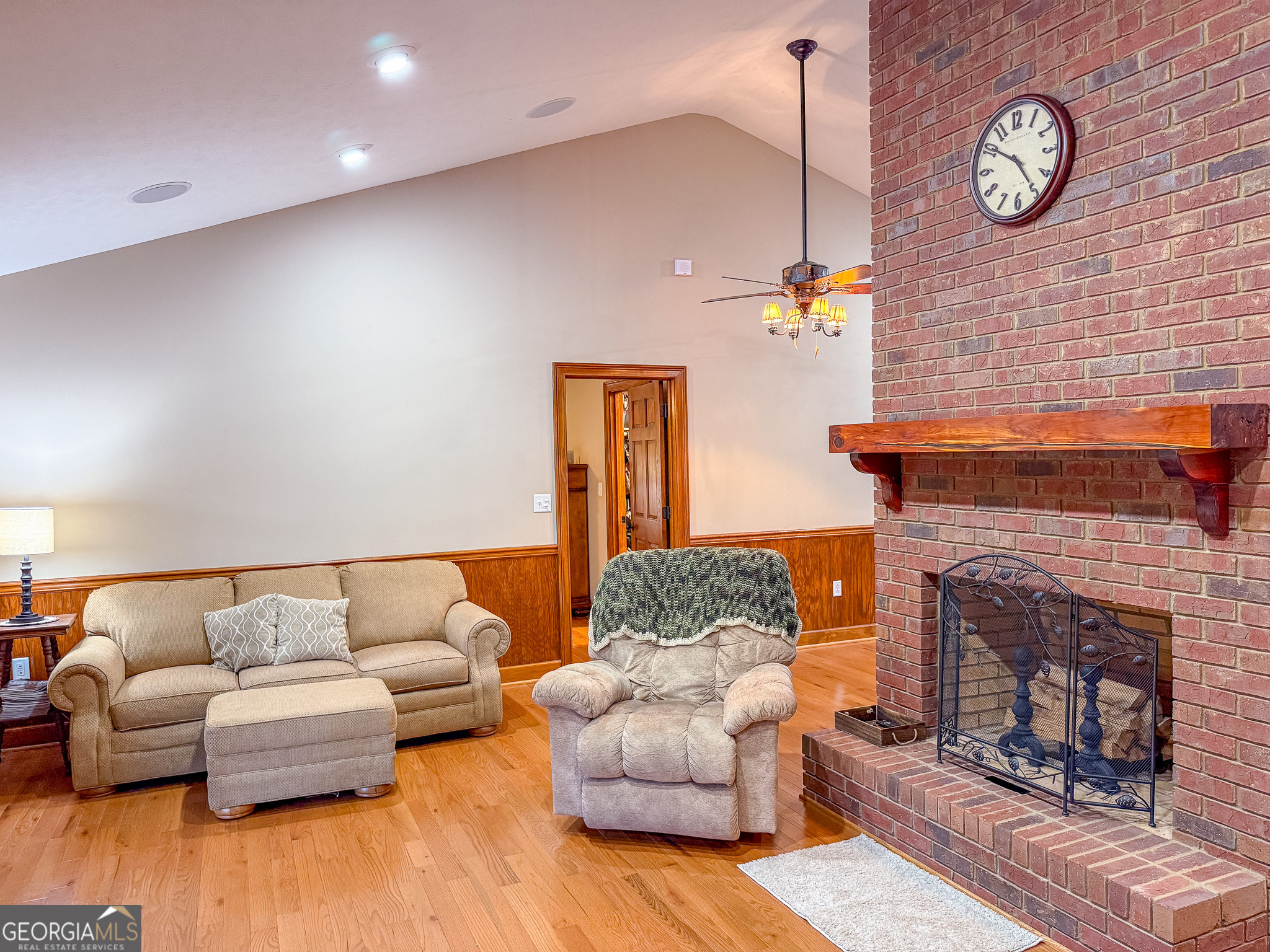 721 Thrasher Road Plains, GA 31780 - Photo 8 of 27 a living room with furniture and a fireplace