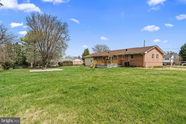 a view of a house with a big yard