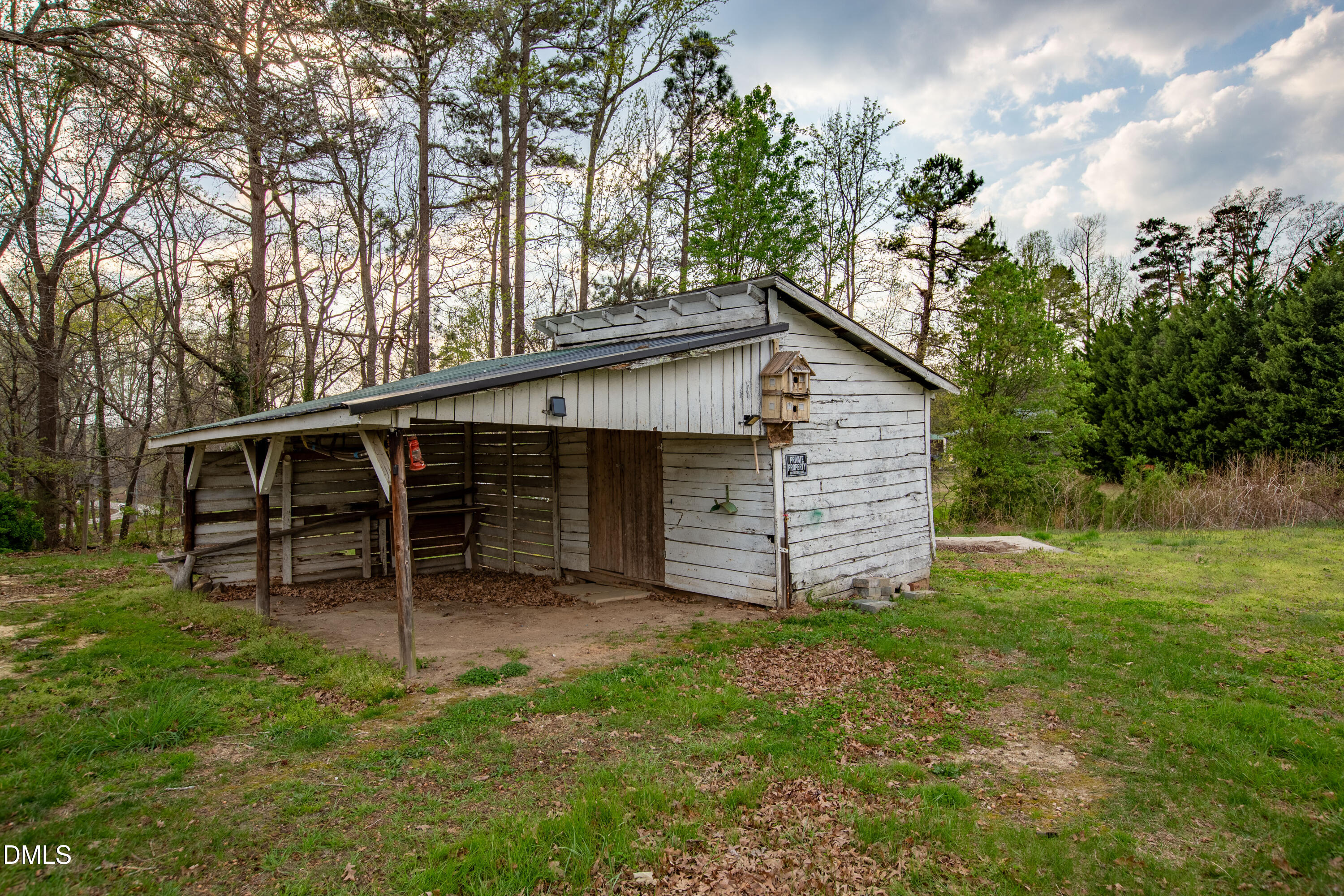 4295 Virgilina Road Roxboro, NC 27574 - Photo 42 of 46 a backyard of a house with lots of green space