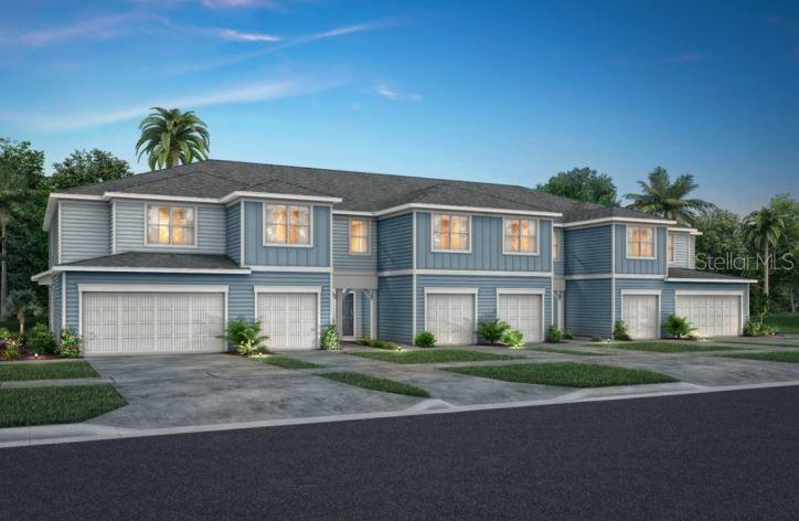 4569 Sparkling Shell Avenue Kissimmee, FL 34746 - Photo 1 of 1 a front view of a house with a garden