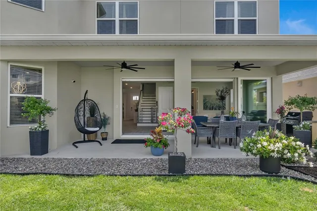 a view of a chair and table in garden
