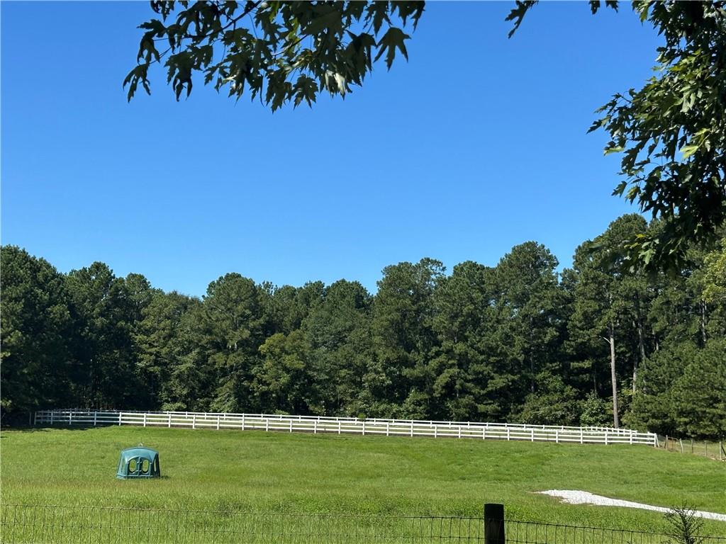 3400 North Sharon Church Road Loganville, GA 30052 - Photo 12 of 53 a view of a golf course with a park