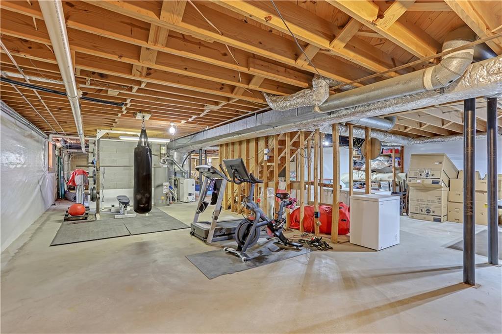 3400 North Sharon Church Road Loganville, GA 30052 - Photo 22 of 53 a view of a room with gym equipment