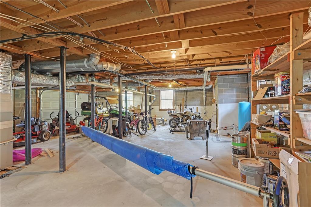 3400 North Sharon Church Road Loganville, GA 30052 - Photo 24 of 53 a view of a storage room with a lot of stuff