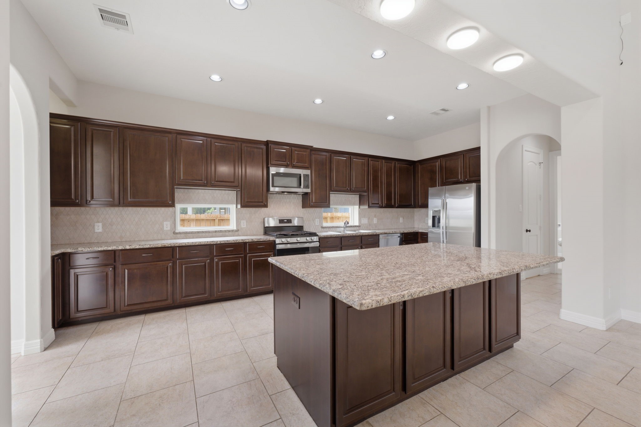 8403 Greenridge Manor Lane Spring, TX 77389 - Photo 13 of 48 This spacious offers a modern and functional space for cooking and entertaining.