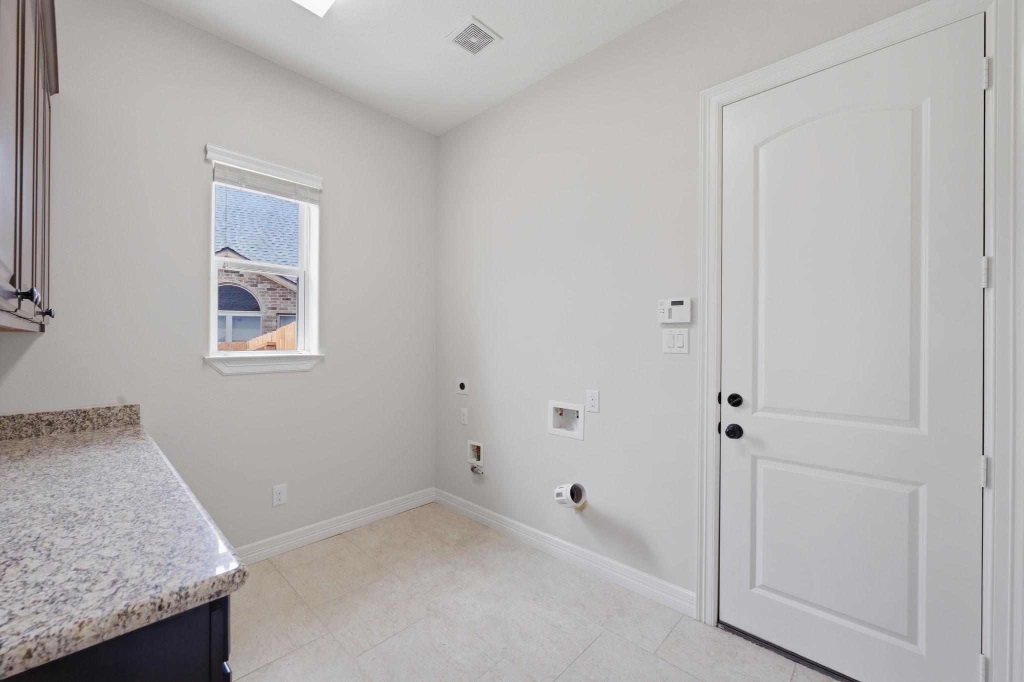 8403 Greenridge Manor Lane Spring, TX 77389 - Photo 15 of 44 Spacious laundry room with folding counter, washer/dryer hookups.