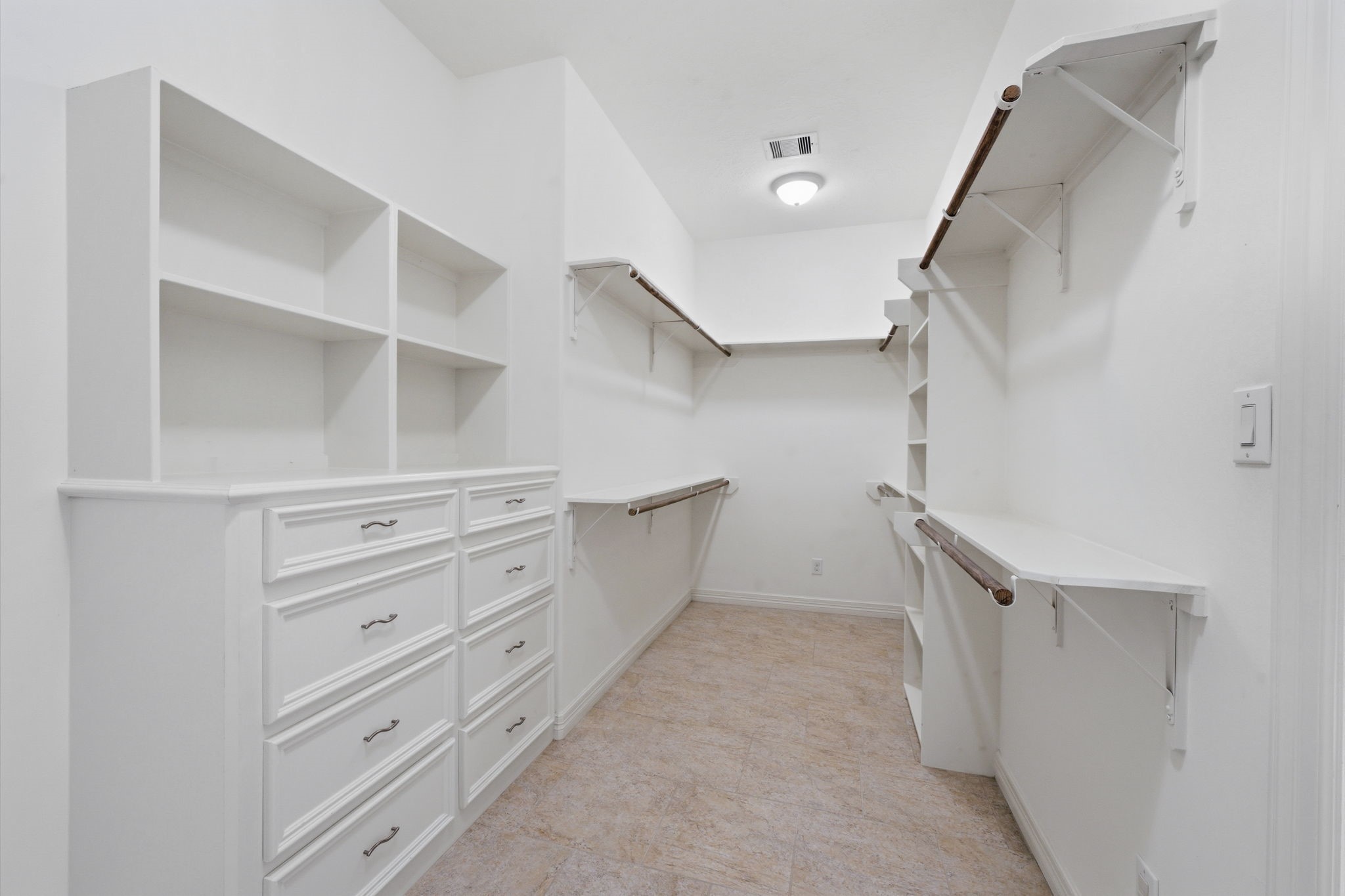 8403 Greenridge Manor Lane Spring, TX 77389 - Photo 24 of 44 Spacious walk-in closet with built-ins, ample storage, and bright lighting.