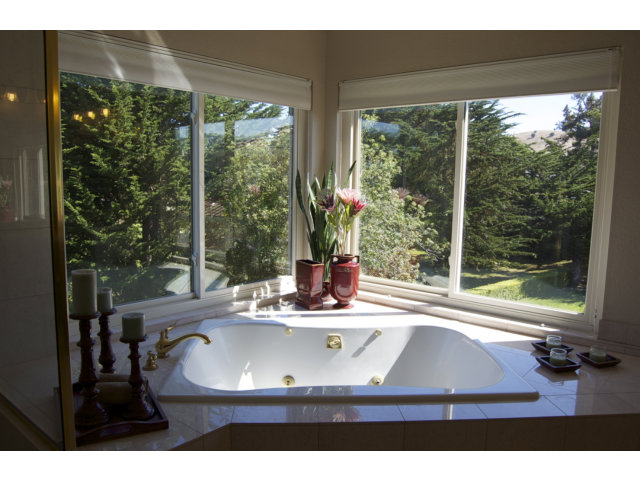 361 Eagle Trace Drive Half Moon Bay, CA 94019 - Photo 13 of 25 a view of a living room and floor to ceiling window
