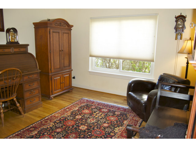 361 Eagle Trace Drive Half Moon Bay, CA 94019 - Photo 17 of 25 a living room with furniture a flat screen tv and a window