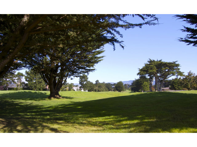 361 Eagle Trace Drive Half Moon Bay, CA 94019 - Photo 22 of 25 a view of a golf course with a lake view