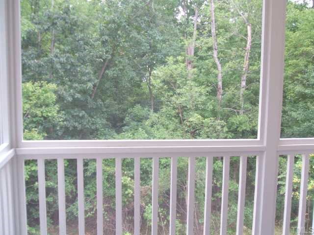 204 Forbes Road Wake Forest, NC 27587 - Photo 12 of 12 Morning coffe, quiet lunch, evening serenity...all found on this sceened porch that overlooks woods and backs to Neuse River Riparian Buffer!